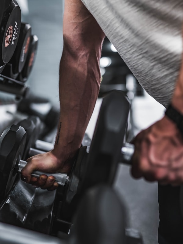 Fitness athlete using gym equipment